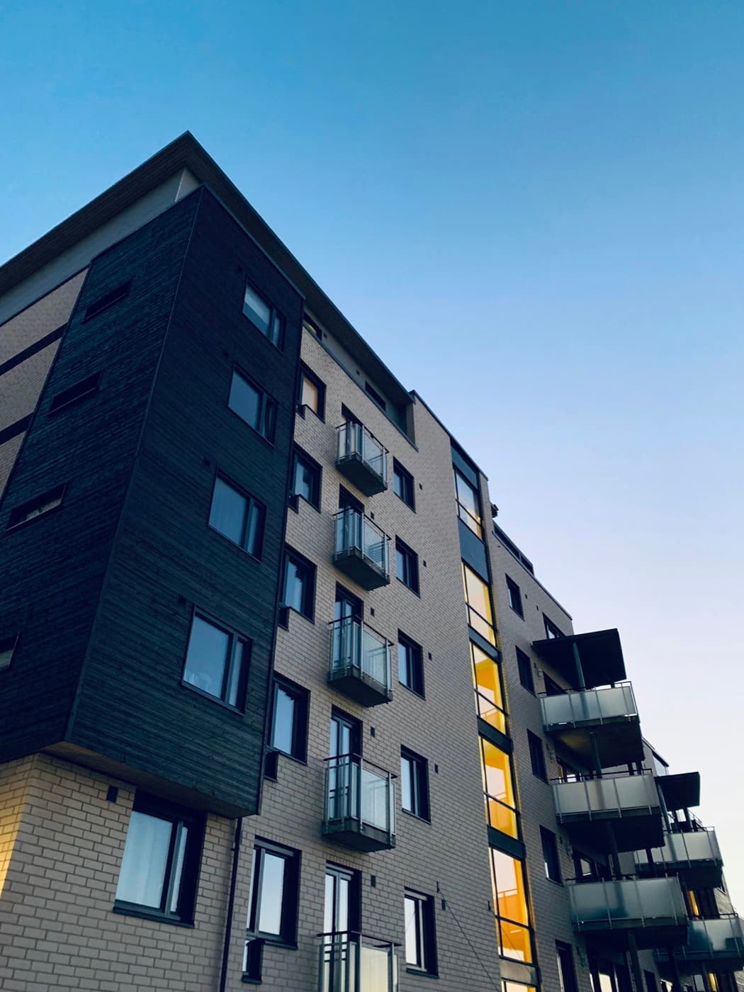 Contemporary luxury apartment building with clean geometric facade